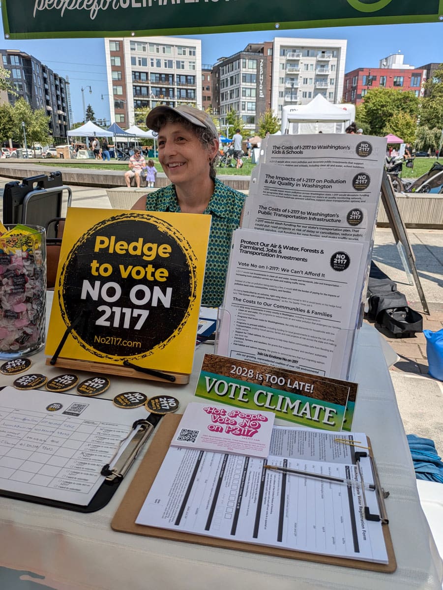 Volunteers help reach voters at a community event in Redmond.